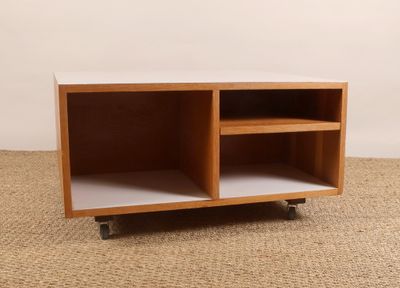 an image of a wooden entertainment center on wheels