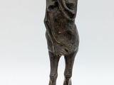 an image of a bronze statue of a woman with a hat on her head