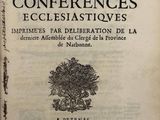 un vieux livre avec l'image d'un arbre dessus