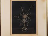 a picture of a picture of a vase with flowers in it