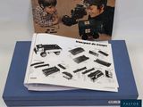 a picture of a book with a picture of a boy playing with a toy truck