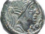 une pièce de monnaie ancienne portant un visage de femme