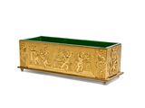 an image of a gold and green planter sitting on top of a wooden stand