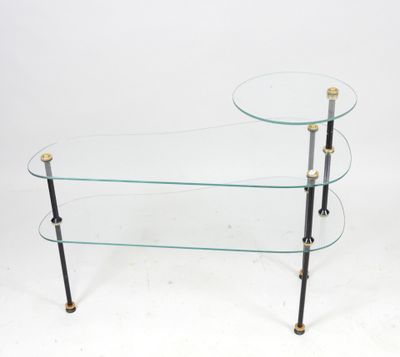 two tiered glass coffee table with brass legs and a glass top