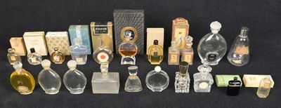 a lot of perfume bottles that are sitting on a table