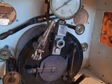 a picture of a room with a clock and a clock on the wall