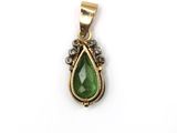 a close up of a green stone pendant on a white background