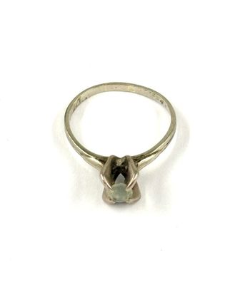 an image of a diamond ring on a white background