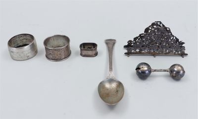 a lot of silver items that are on a table