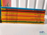 a stack of children ' s books sitting on a table