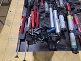 a lot of different types of tools on a table