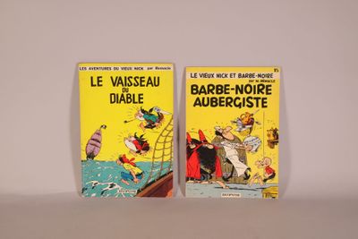 two books are sitting on a white surface next to each other