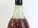 a bottle of liquor that is sitting on a table