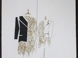 a drawing of a dress on a mannequin on a table