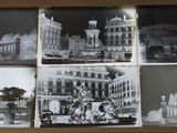 several black and white photos of a window with pictures of buildings