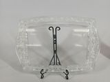 a clear glass case with a hook on it