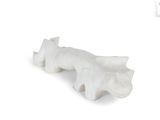 a white sculpture of a bear on a white background