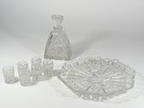 a lot of glass items that are sitting on a table