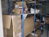 many boxes on the shelves in the room
