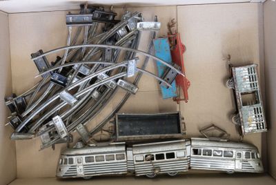 a box with a bunch of toy trains in it