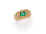 an emerald and diamond ring