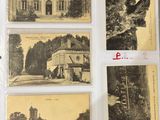 an old photo of a book with pictures of buildings and trees