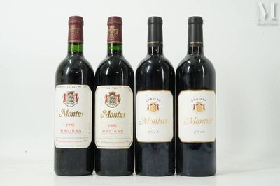 three bottles of red wine are lined up on a table