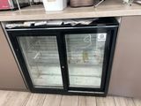 two glass doors that are open on the counter