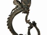 statue of a dragon on a white background with a white background