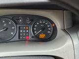 a close up of the dashboard of a car with the gauges on