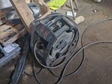 an image of a pile of tools and tools in a garage