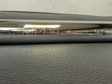 an image of a close up of a cell phone on a car seat