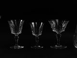black and white photograph of a set of wine glasses and decanter