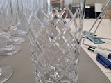 a table with a bunch of glasses and a pen on it