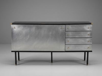 the sideboard is made of metal and has four drawers