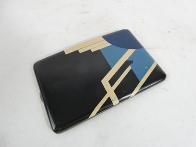a black laptop with a blue and yellow design on it