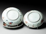 pair of chinese blue and white bowls and saucers with floral designs