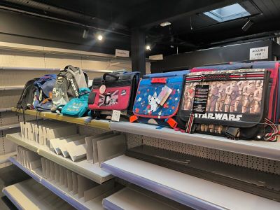 many bags on the shelves in the store