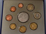 an image of a set of six different coins in a box