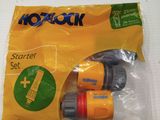 a close up of a package of water hoses sitting on a table