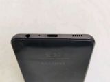 the back of a black samsung s9 phone with the camera facing towards it