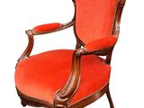 an old fashioned chair with red upholstered upholstered upholstered upholstered upholstered