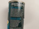 a can of canned food on a white surface