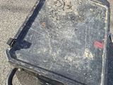 a small table that is sitting in the middle of a parking lot
