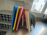 a lot of different colored folders sitting on a table