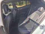 the back seats of a car with a seat belt in a car