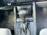 a close up of a car ' s interior with a gear box