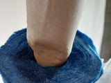 a close up of a blue cloth wrapped around a pole