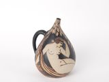 a black and white vase with a nude woman on it