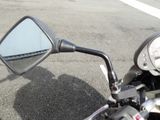 a motorcycle that is parked on the side of the road